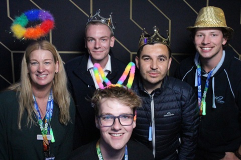 People at the disco photo booth
